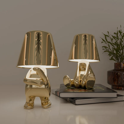 Golden Thinkers Lamp Collection