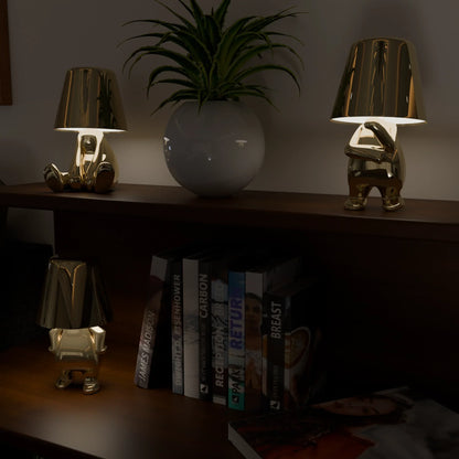 Golden Thinkers Lamp Collection