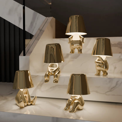 Golden Thinkers Lamp Collection