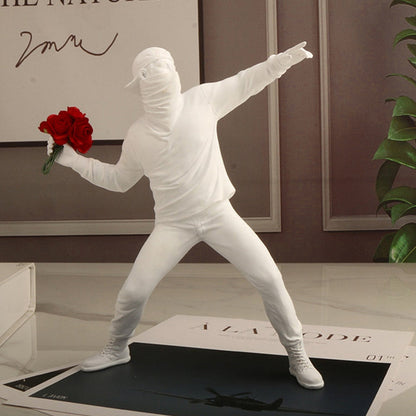 The Rioter Sculpture – street-art-inspired figure with flower bouquet – STUDIO GONKA