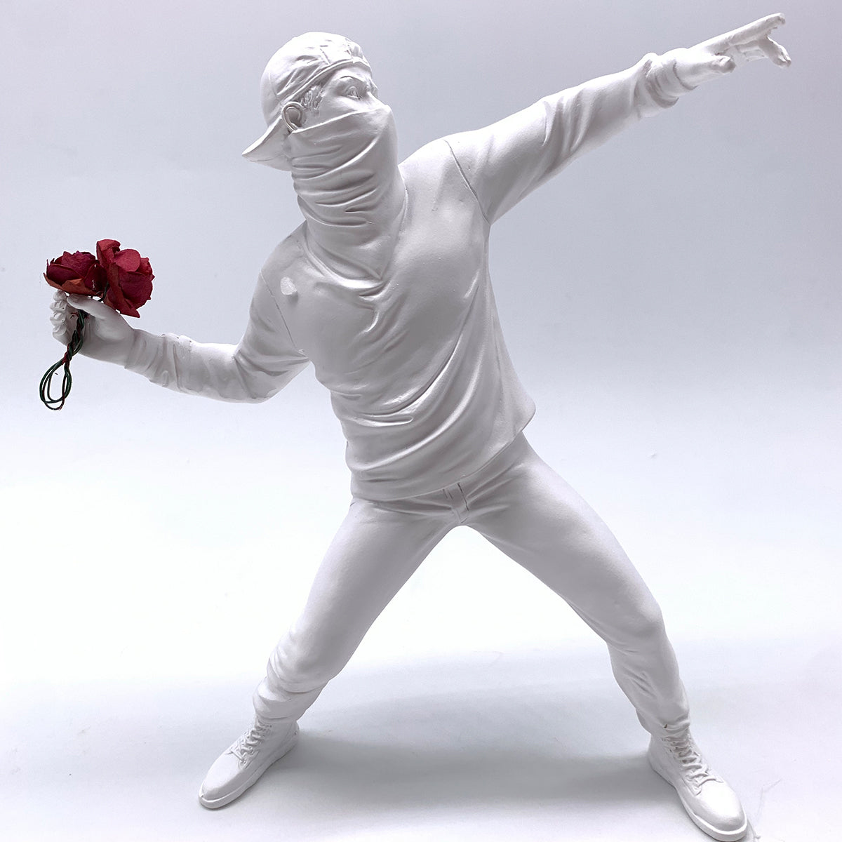 The Rioter Sculpture – street-art-inspired figure with flower bouquet – STUDIO GONKA